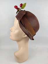 Load image into Gallery viewer, Original 1920's Brown Lacquered Straw Cloche with Upturned Brim and Cherry Trim *