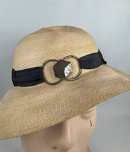 Load image into Gallery viewer, Original 1930's French Made Silk Lined Natural Straw Hat with Black Grosgrain and Metal Trim