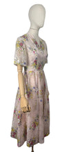 Load image into Gallery viewer, Original 1950's Pretty Pale Pink Nylon Dress with Floral Print in Blue, Yellow and White - Bust 36 37
