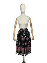 Load image into Gallery viewer, Original 1950's Floral Border Print Skirt in Black, Pink, White and Green Featuring Violets - Waist 24" *