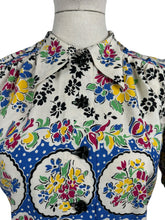 Load image into Gallery viewer, Reproduction 1940's Cotton Boarder Print Blouse in Bold Floral in Black, Green, Blue, Pink, Black and Yellow - Bust 34