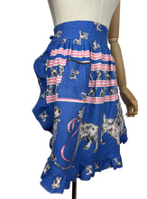 Load image into Gallery viewer, Original 1950's Bright Cotton Novelty Print Frilly Pinny with Spaniel Dogs on Blue - Waist 30