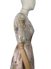 Load image into Gallery viewer, Original 1950's Pretty Pale Pink Nylon Dress with Floral Print in Blue, Yellow and White - Bust 36 37