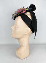 Load image into Gallery viewer, Original 1940’s Black Topper Hat with Pastel Flowers in Pink, Purple and Blue and Huge Bow Trim *