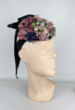 Load image into Gallery viewer, Original 1940’s Black Topper Hat with Pastel Flowers in Pink, Purple and Blue and Huge Bow Trim *