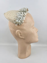 Load image into Gallery viewer, Original 1950's Ice Blue and Ivory Lacquered Raffia Half Hat with Petal Trim and Velvet Bow