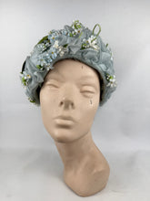 Load image into Gallery viewer, Original 1960's Blue Nylon Hat with White, Blue and Green Floral Trim