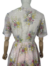 Load image into Gallery viewer, Original 1950's Pretty Pale Pink Nylon Dress with Floral Print in Blue, Yellow and White - Bust 36 37