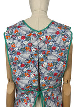 Load image into Gallery viewer, Deadstock Original 1940's CC41 Brightly Patterned Cotton Apron in Blue, Red, Orange, Green and White - Bust 34 36 *