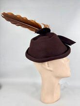 Load image into Gallery viewer, Original 1940's Warn Brown Felt Hat by Jacoll with Large Bow Trim and Chestnut Brown Feather