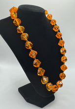 Load image into Gallery viewer, Original 1950's Mid Century Amber Coloured Plastic Faceted Bead Necklace with Barrel Clasp