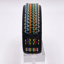 Load image into Gallery viewer, 1940's Make Do and Mend Wire Cuff Bracelet in Black, White, Red, Blue, Orange, Yellow and Green 'Telephone Wire'