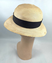 Load image into Gallery viewer, Original 1930's French Made Silk Lined Natural Straw Hat with Black Grosgrain and Metal Trim