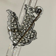 Load image into Gallery viewer, Original 1950's Painted Punched Steel Squirrel Brooch Holding a Faux Pearl