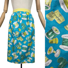 Load image into Gallery viewer, Original 1950's Novelty Print Cotton Apron with Sewing Theme in Blue, Yellow and Green - Waist 38 40