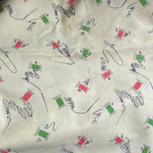 Load image into Gallery viewer, Original 1940’s Novelty Print Cotton Dress Fabric in Buttermilk with Cotton Reels in Pink and Green and Black Sewing Needles and Thread