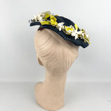 Load image into Gallery viewer, Original 1950’s Lacquered Raffia Hat with Flower Trim and Net in Navy, White and Yellow