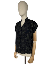 Load image into Gallery viewer, Original 1950’s Black Artificial Silk Blouse with Silver and Gold Glitter Floral Print and Glass Buttons - Bust 36 *