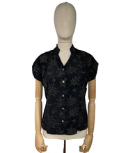 Load image into Gallery viewer, Original 1950’s Black Artificial Silk Blouse with Silver and Gold Glitter Floral Print and Glass Buttons - Bust 36 *