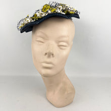 Load image into Gallery viewer, Original 1950’s Lacquered Raffia Hat with Flower Trim and Net in Navy, White and Yellow