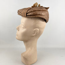 Load image into Gallery viewer, Original 1950's Light Brown Lacquered Raffia Hat with Bow Trim by Jacoll *