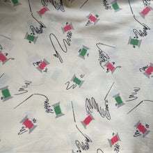 Load image into Gallery viewer, Original 1940’s Novelty Print Cotton Dress Fabric in Buttermilk with Cotton Reels in Pink and Green and Black Sewing Needles and Thread