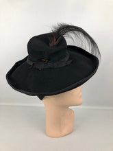 Load image into Gallery viewer, 1940s Wide Black Felt Hat With Huge Feather Trim