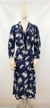 Load image into Gallery viewer, Original 1930s Navy and White Silk Volup Floral Print Dress with Bow Tie Neck - Bust 40 42