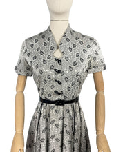 Load image into Gallery viewer, Original 1950's Silver and Black Cocktail Dress by For You By Blaines with Glass Buttons and Pockets - Bust 35