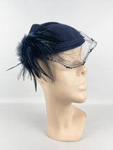 Load image into Gallery viewer, Original 1930s Navy Blue Felt Hat with Feather Trim and Neat Net Detail