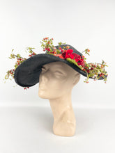 Load image into Gallery viewer, Absolutely Incredible Huge Black Straw Hat with Wonderful Flower Trim from the 1920's or 1930's *