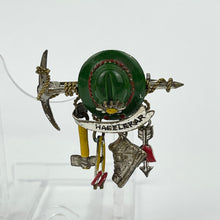 Load image into Gallery viewer, 1940s Painted Metal Austrian Tourist Brooch with Hat, Walking Canes, Boot, Pickaxe and Arrow with a Love Heart