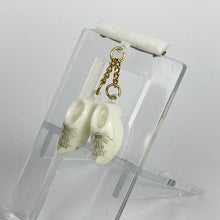 Load image into Gallery viewer, Vintage White Plastic Bar Brooch with Two Little Clogs Hanging - Vintage Dutch Tourist Pin