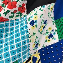Load image into Gallery viewer, Original 1950s Reversible Circle Skirt in Patchwork Print and Black - Waist 28"