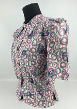 Load image into Gallery viewer, 1940's Reproduction Novelty Print Blouse with Clocks and Clock Hands with Spherical Pink Buttons Made From an Original 1940's Feed Sack - Bust 34"