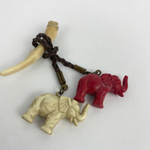 Load image into Gallery viewer, Original 1940s Red and White Early Plastic Elephants and Tusk Brooch