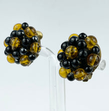 Load image into Gallery viewer, Vintage 1950's German Made Black and Gold Glass Clip-on Earrings
