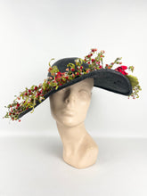Load image into Gallery viewer, Absolutely Incredible Huge Black Straw Hat with Wonderful Flower Trim from the 1920's or 1930's *