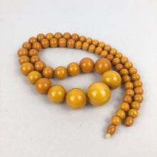 Load image into Gallery viewer, 1940s Egg Yolk Yellow Bakelite Necklace