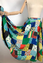 Load image into Gallery viewer, Original 1950s Reversible Circle Skirt in Patchwork Print and Black - Waist 28"