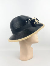 Load image into Gallery viewer, Original 1930s Black and Cream Lacquered Straw Hat with Velvet Floral Trim