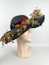Load image into Gallery viewer, Absolutely Incredible Huge Black Straw Hat with Wonderful Flower Trim from the 1920's or 1930's *