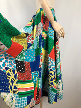 Load image into Gallery viewer, Original 1950s Reversible Circle Skirt in Patchwork Print and Black - Waist 28"