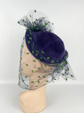 Load image into Gallery viewer, Original 1950s Purple Felt Hat with Green and Purple Net - Charming French Made Piece
