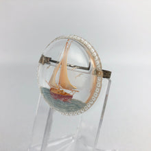 Load image into Gallery viewer, Original 1940s 1950s Circular Reverse Carved Lucite Brooch with Sailing Ship on the Sea