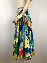 Load image into Gallery viewer, Original 1950s Reversible Circle Skirt in Patchwork Print and Black - Waist 28"