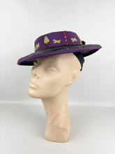 Load image into Gallery viewer, Original 1940's Indigo Blue Lacquered Straw Hat with Purple Trim and Applique Dogs