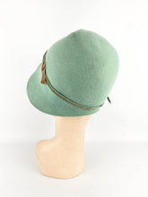 Load image into Gallery viewer, Original 1920’s Soft Green Felt Cloche with Chocolate Brown Velvet Ribbon Trim