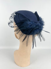 Load image into Gallery viewer, Original 1930s Navy Blue Felt Hat with Feather Trim and Neat Net Detail