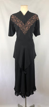 Load image into Gallery viewer, 1940s Black Dress with Lace Overlay and Fishtail Peplum -B38